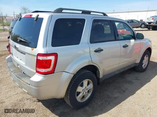 2010 Ford Escape XLT with VIN 1FMCU0D79AKB28893, listed as a IAAI auction lot 42123988 with 200,471 mi miles. Bid and sale history available at carsss.com. Image 4.