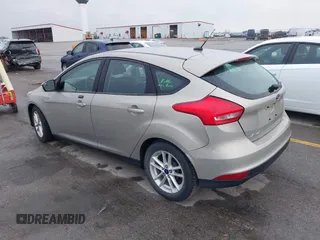 2015 Ford Focus SE with VIN 1FADP3K21FL211511, listed as a IAAI auction lot 42153828 with 126,111 mi miles. Bid and sale history available at carsss.com. Image 3.