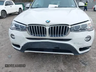 2017 BMW X3 xDrive28i with VIN 5UXWX9C36H0W68556, listed as a IAAI auction lot 41217277 with 120,572 mi miles and . Bid and sale history available at DreamBid. Image 6.