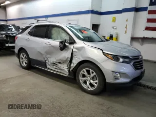 2020 Chevrolet Equinox Premier z VIN 2GNAXXEV3L6128099, wystawiony jako Copart lot #79041114 z przebiegiem 65 856 mil mil oraz Szkoda całkowita • Salvage title. Historia ofert i sprzedaży dostępna na DreamBid. Obrazek 4.