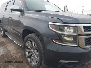 2020 Chevrolet Suburban Premier with VIN 1GNSCJKC8LR290783, listed as a IAAI auction lot 42636126 with 59,371 mi miles and . Bid and sale history available at DreamBid. Image 6.