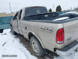 1998 Ford F-150 Standard with VIN 1FTZX18W4WNB04665, listed as a IAAI auction lot 41255136 with 182,272 mi miles. Bid and sale history available at carsss.com. Image 3.