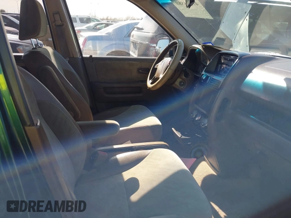 2002 Honda CR-V EX with VIN JHLRD78842C040973, listed as a IAAI auction lot 41214880 with 153,429 mi miles and . Bid and sale history available at DreamBid. Image 5.