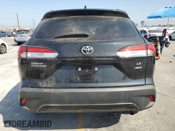 2023 Toyota Corolla Cross LE with VIN 7MUCAABG1PV050123, listed as a Copart auction lot 61384845 with 30,712 mi miles and Salvage title. Bid and sale history available at DreamBid. Image 6.