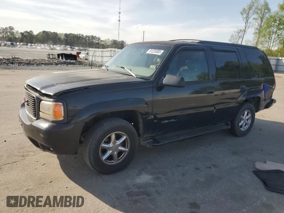 1999 GMC Denali with VIN 1GKEK13R1XR912632, listed as a Copart auction lot 51223085 with 223,201 mi miles and Salvage Title. Bid and sale history available at carsss.com. Image 1.