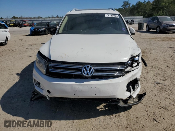 2012 Volkswagen Tiguan SEL with VIN WVGAV7AX9CW530331, listed as a Copart auction lot 50129405 with 141,387 mi miles and Salvage Title. Bid and sale history available at DreamBid. Image 5.