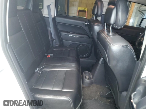 2014 Jeep Patriot Limited z VIN 1C4NJPCB9ED646470, wystawiony jako Copart lot #88624725 z przebiegiem 83 717 mil mil oraz Szkoda całkowita • Salvage title. Historia ofert i sprzedaży dostępna na DreamBid. Obrazek 11.