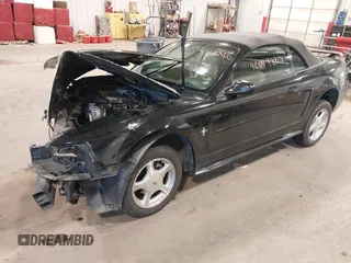 2001 Ford Mustang Deluxe with VIN 1FAFP44471F209492, listed as a IAAI auction lot 42049807 with 46,737 mi miles and . Bid and sale history available at DreamBid. Image 2.
