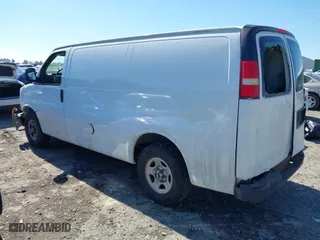 2005 GMC Savana Cargo Van with VIN 1GTFG15X451230398, listed as a IAAI auction lot 41666945 with 251,720 mi miles. Bid and sale history available at carsss.com. Image 3.