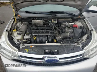 2008 Ford Focus SE z VIN 1FAHP33NX8W147139, wystawiony jako Copart lot #57520415 z przebiegiem 151 852 mil mil oraz Szkoda całkowita • Salvage title. Historia ofert i sprzedaży dostępna na DreamBid. Obrazek 11.