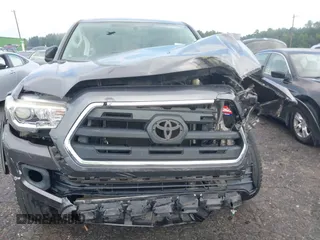 2016 Toyota Tacoma SR with VIN 5TFRX5GN6GX070766, listed as a IAAI auction lot 40461070 with 144,039 mi miles and . Bid and sale history available at DreamBid. Image 12.