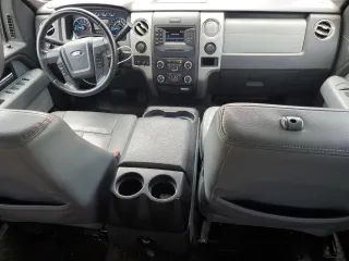 2014 Ford F-150 XL with VIN 1FTFW1CT7EKG41338, listed as a Copart auction lot 60037405 with 128,130 mi miles and Salvage title. Bid and sale history available at DreamBid. Image 8.
