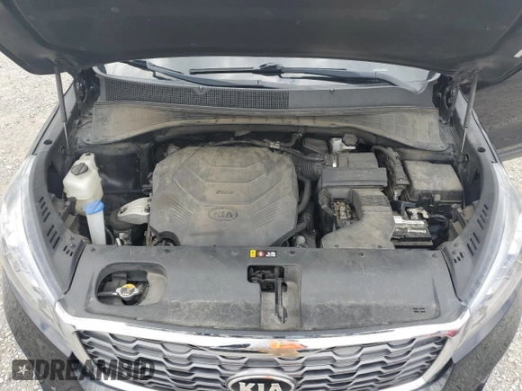 2019 Kia Sorento EX z VIN 5XYPHDA53KG457567, wystawiony jako Copart lot #57665945 z przebiegiem 150 392 mil mil oraz Czysty tytuł • Clean title. Historia ofert i sprzedaży dostępna na DreamBid. Obrazek 12.
