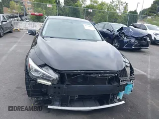 2015 Infiniti Q50 z VIN JN1BV7AP3FM336566, wystawiony jako IAAI lot #42349544 z przebiegiem 84 077 mil mil oraz . Historia ofert i sprzedaży dostępna na DreamBid. Obrazek 13.