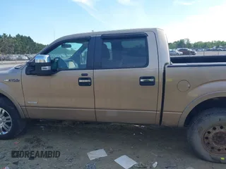 2012 Ford F-150 XL with VIN 1FTFW1ET1CFA03279, listed as a IAAI auction lot 42107076 with 160,972 mi miles. Bid and sale history available at carsss.com. Image 14.