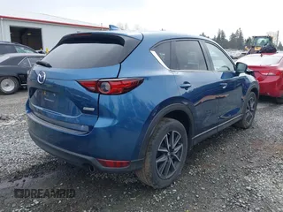 2017 Mazda CX-5 Grand Touring with VIN JM3KFADL5H0100146, listed as a IAAI auction lot 41997181 with 80,071 mi miles. Bid and sale history available at carsss.com. Image 4.