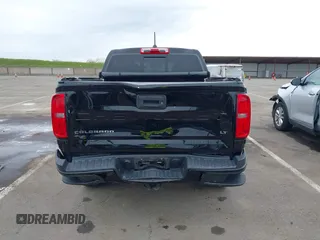 2021 Chevrolet Colorado 2WD LT with VIN 1GCGSCEA3M1178576, listed as a IAAI auction lot 41841016 with 87,291 mi miles and . Bid and sale history available at DreamBid. Image 16.