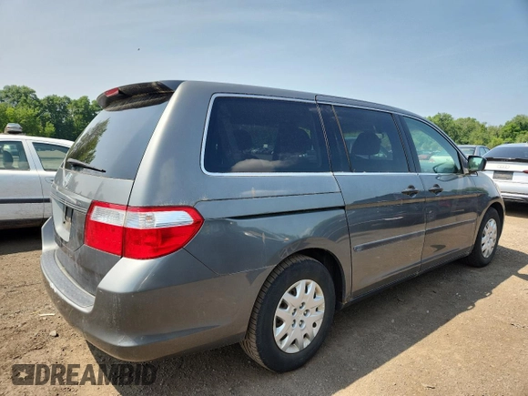 2007 Honda Odyssey LX z VIN 5FNRL38257B011710, wystawiony jako Copart lot #61163265 z przebiegiem 196 575 mil mil oraz Czysty tytuł • Clean title. Historia ofert i sprzedaży dostępna na DreamBid. Obrazek 3.