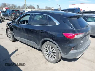 2020 Ford Escape Titanium Hybrid with VIN 1FMCU0DZ9LUC08090, listed as a IAAI auction lot 41674697 with 43,586 mi miles and . Bid and sale history available at DreamBid. Image 3.