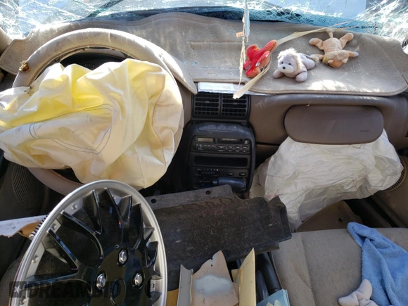 1998 Saturn SL with VIN 1G8ZH5281WZ186209, listed as a Copart auction lot 54977735 with Not provided miles and Non repairable. Bid and sale history available at DreamBid. Image 8.