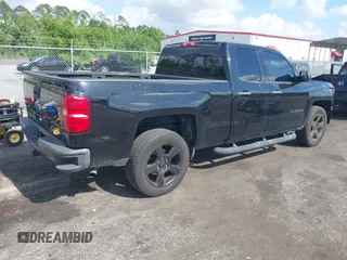 2015 Chevrolet Silverado 1500 LS with VIN 1GCRCPEH4FZ411072, listed as a IAAI auction lot 42083203 with 75,372 mi miles and . Bid and sale history available at DreamBid. Image 4.