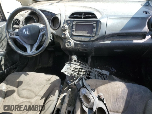2013 Honda Fit Sport z VIN JHMGE8H68DC053863, wystawiony jako Copart lot #52140945 z przebiegiem Nie podano mil oraz Szkoda całkowita • Salvage title. Historia ofert i sprzedaży dostępna na DreamBid. Obrazek 8.