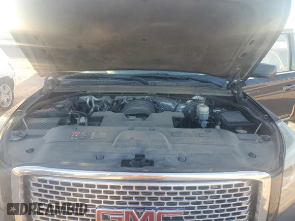 2015 GMC Yukon Denali with VIN 1GKS1CKJ7FR132677, listed as a Copart auction lot 82118584 with 144,798 mi miles and Salvage Title. Bid and sale history available at carsss.com. Image 12.