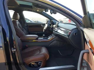 2013 Audi A8 L 4.0L with VIN WAUR2AFD3DN012893, listed as a IAAI auction lot 41209419 with 116,990 mi miles. Bid and sale history available at carsss.com. Image 5.