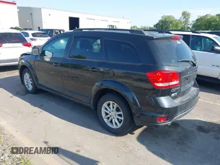 2013 Dodge Journey SXT with VIN 3C4PDDBG1DT606887, listed as a IAAI auction lot 42440507 with 250,836 mi miles and . Bid and sale history available at DreamBid. Image 3.