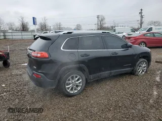 2015 Jeep Cherokee Latitude with VIN 1C4PJMCBXFW504433, listed as a Copart auction lot 52767515 with 141,969 mi miles and Clean Title. Bid and sale history available at carsss.com. Image 3.
