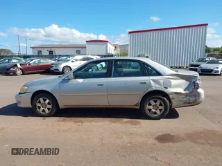 2003 Toyota Avalon XL z VIN 4T1BF28B93U274928, wystawiony jako IAAI lot #42034461 z przebiegiem 150 549 mil mil oraz . Historia ofert i sprzedaży dostępna na DreamBid. Obrazek 15.