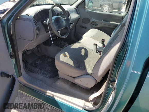 1997 Ford F-150 z VIN 1FTDF1728VNA87864, wystawiony jako Copart lot #74465184 z przebiegiem 205 501 mil mil oraz Szkoda całkowita • Salvage title. Historia ofert i sprzedaży dostępna na DreamBid. Obrazek 8.