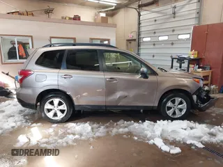 2014 Subaru Forester 2.5i Touring with VIN JF2SJAPC3EH541727, listed as a IAAI auction lot 41812809 with 94,506 mi miles. Bid and sale history available at carsss.com. Image 14.