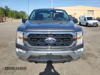 2022 Ford F-150 XL with VIN 1FTFX1E58NFB61927, listed as a Copart auction lot 55233035 with 66,591 mi miles and Salvage title. Bid and sale history available at DreamBid. Image 5.