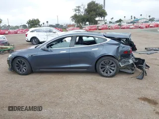 2020 Tesla Model S Long Range with VIN 5YJSA1E29LF363957, listed as a IAAI auction lot 42402667 with 45,058 mi miles and . Bid and sale history available at DreamBid. Image 14.