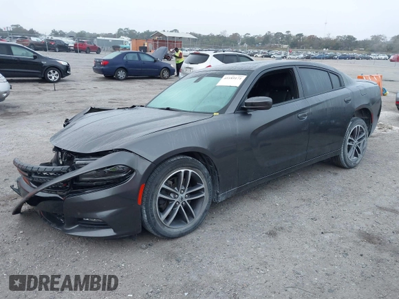 2019 Dodge Charger SXT with VIN 2C3CDXJG1KH730489, listed as a IAAI auction lot 41189171 with 39,514 mi miles and . Bid and sale history available at DreamBid. Image 2.
