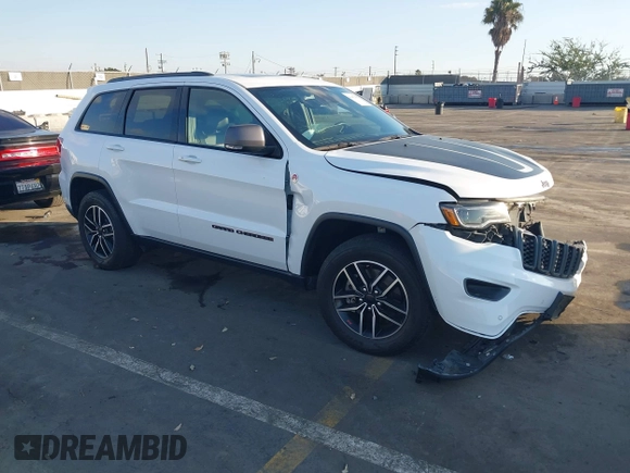 2021 Jeep Grand Cherokee Trailhawk with VIN 1C4RJFLG5MC565316, listed as a IAAI auction lot 41402435 with 69,261 mi miles. Bid and sale history available at carsss.com. Image 1.