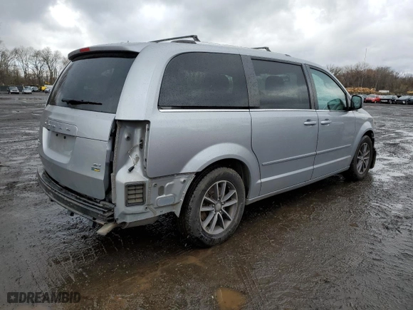 2017 Dodge Grand Caravan SXT with VIN 2C4RDGCG1HR624209, listed as a Copart auction lot 52095335 with 156,761 mi miles and Salvage Title. Bid and sale history available at carsss.com. Image 3.