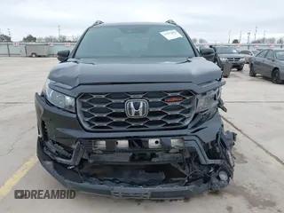 2023 Honda Passport TrailSport with VIN 5FNYF8H67PB006933, listed as a IAAI auction lot 41597859 with 34,145 mi miles and . Bid and sale history available at carsss.com. Image 13.