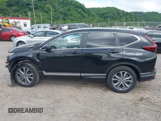 2021 Honda CR-V Touring with VIN 5J6RW2H92ML003064, listed as a IAAI auction lot 42298361 with 70,988 mi miles and . Bid and sale history available at DreamBid. Image 15.