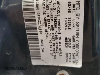 2005 Saturn ION ION 1 z VIN 1G8AG52F95Z156310, wystawiony jako Copart lot #83634554 z przebiegiem 143 420 mil mil oraz Szkody całkowita. Historia ofert i sprzedaży dostępna na DreamBid. Obrazek 12.