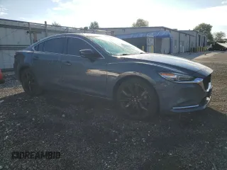 2021 Mazda 6 Grand Touring Reserve with VIN JM1GL1WY3M1602898, listed as a Copart auction lot 67871314 with 104,679 mi miles and Salvage Title. Bid and sale history available at DreamBid. Image 4.