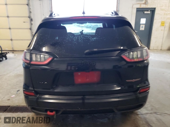 2019 Jeep Cherokee Trailhawk z VIN 1C4PJMBX2KD317917, wystawiony jako Copart lot #61079955 z przebiegiem 94 169 mil mil oraz Czysty tytuł • Clean title. Historia ofert i sprzedaży dostępna na DreamBid. Obrazek 6.