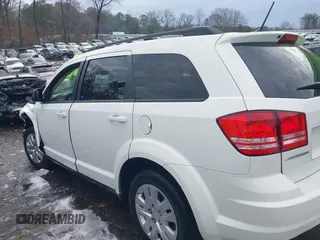 2018 Dodge Journey SE with VIN 3C4PDCAB1JT295988, listed as a IAAI auction lot 41226385 with 106,639 mi miles. Bid and sale history available at carsss.com. Image 14.