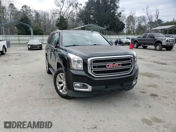 2015 GMC Yukon SLT with VIN 1GKS1BKC1FR615562, listed as a Copart auction lot 46374135 with 141,207 mi miles and Salvage Title. Bid and sale history available at carsss.com. Image 12.