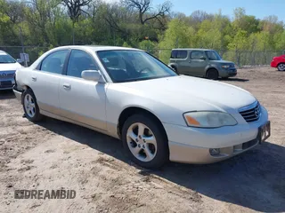 2001 Mazda Millenia z VIN JM1TA221111714677, wystawiony jako IAAI lot #42203182 z przebiegiem 130 847 mil mil oraz . Historia ofert i sprzedaży dostępna na DreamBid. Obrazek 1.
