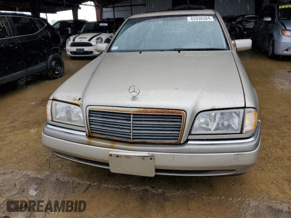 1997 Mercedes-Benz C with VIN WDBHA28E3VF530316, listed as a Copart auction lot 85938384 with 169,664 mi miles and Salvage Title. Bid and sale history available at carsss.com. Image 5.