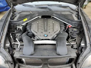2011 BMW X6 50i with VIN 5UXFG8C56BLZ96125, listed as a Copart auction lot 84271244 with 69,732 mi miles and Salvage Title. Bid and sale history available at carsss.com. Image 12.