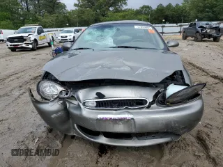 1999 Mercury Sable LS with VIN 1MEFM53U6XG646248, listed as a Copart auction lot 57859405 with 128,286 mi miles and Salvage title. Bid and sale history available at DreamBid. Image 5.