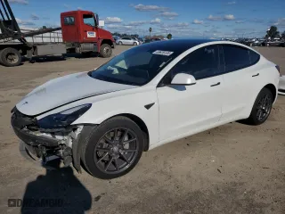2021 Tesla Model 3 Standard Range Plus with VIN 5YJ3E1EA8MF074974, listed as a Copart auction lot 49626135 with 60,778 mi miles and Salvage Title. Bid and sale history available at carsss.com. Image 1.